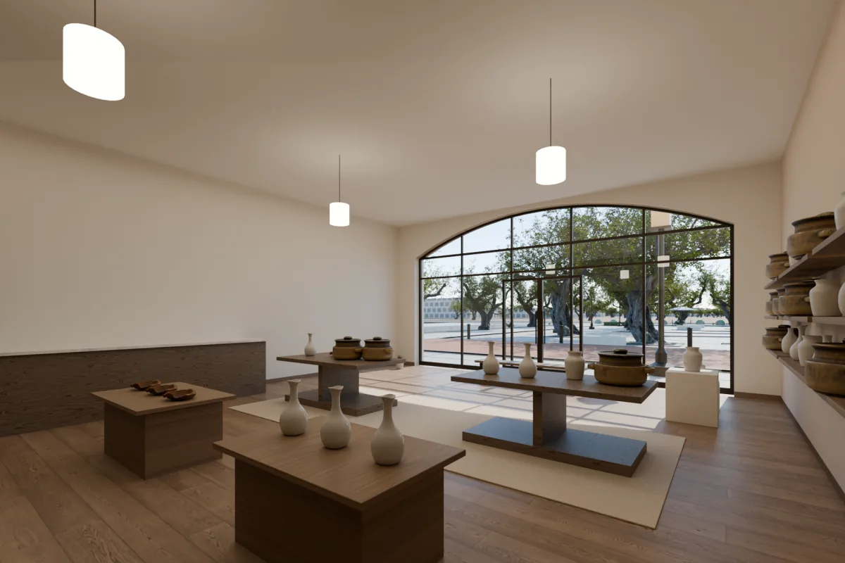Shop with oak shelving, walnut display tables and ceramics on plinths by the window.
