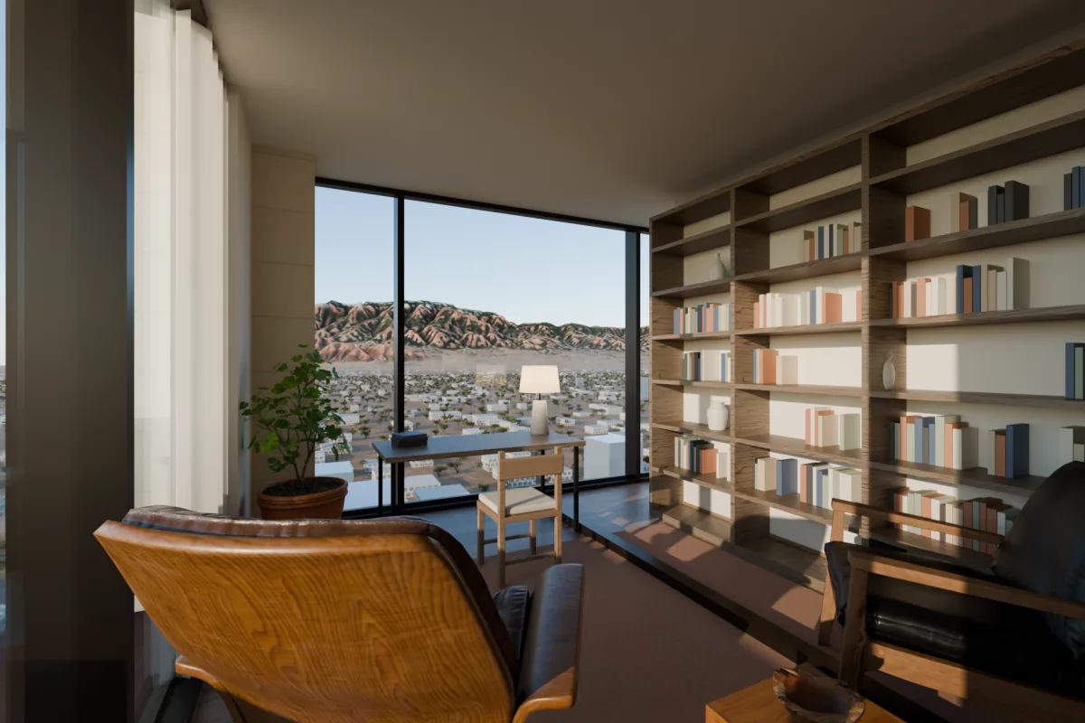 Den with a full-height bookcase, a leather lounge chair and windows facing the mountains.