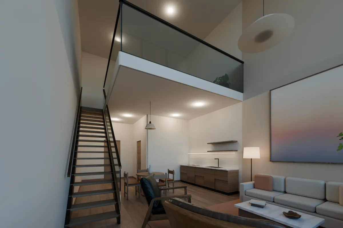 Double-height living room of a studio loft, with a stair to the sleeping loft.